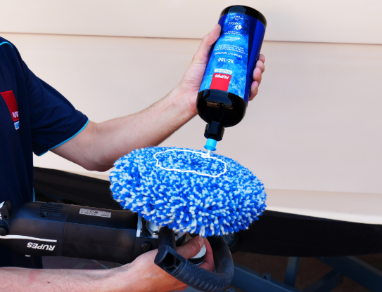 RUPES Marine XC-100 Extra Cut Compound applied to a wool pad